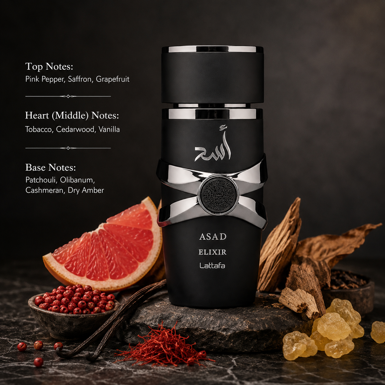 Lattafa Asad Elixir Eau de Parfum presented in a luxurious and masculine fragrance composition. The matte black bottle with polished silver accents is displayed on a dark stone surface, surrounded by pink pepper, saffron, grapefruit, tobacco, cedarwood, vanilla, olibanum resin, patchouli, and amber-inspired elements, reflecting the fragrance's warm spicy, woody, and amber character.