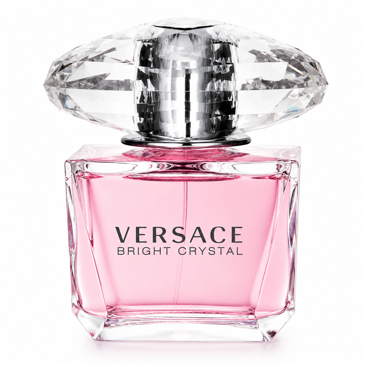 Versace Bright Crystal Eau de Toilette bottle isolated on a white background, featuring a transparent square glass bottle filled with soft pink fragrance, topped with an oversized crystal-inspired faceted cap that reflects light, creating an elegant and luxurious appearance.